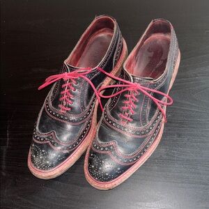 Allen Edmonds Black Leather Wingtip Oxfords with Red Accents